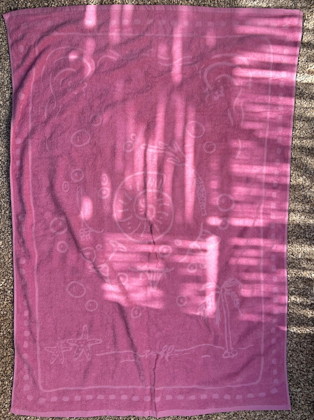 the pink beach towel