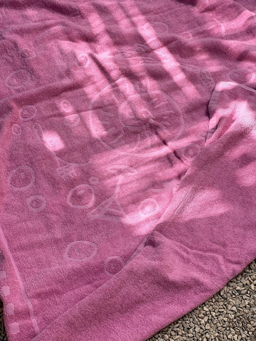 the pink beach towel