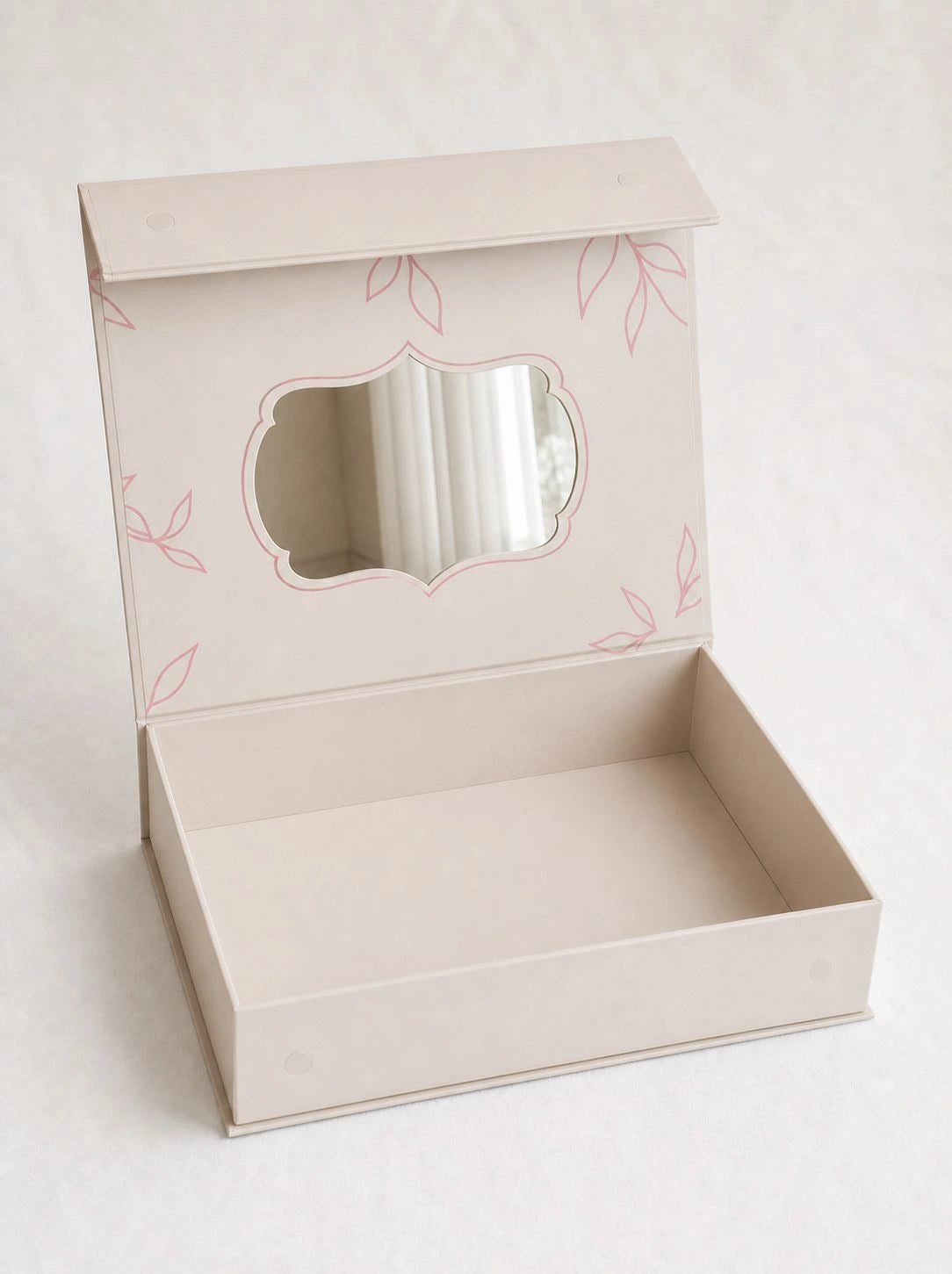White box with floral patterns on a white background