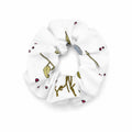 A white fabric scrunchie featuring a delicate gold and green botanical pattern with small red berry accents, shown against a plain white background.