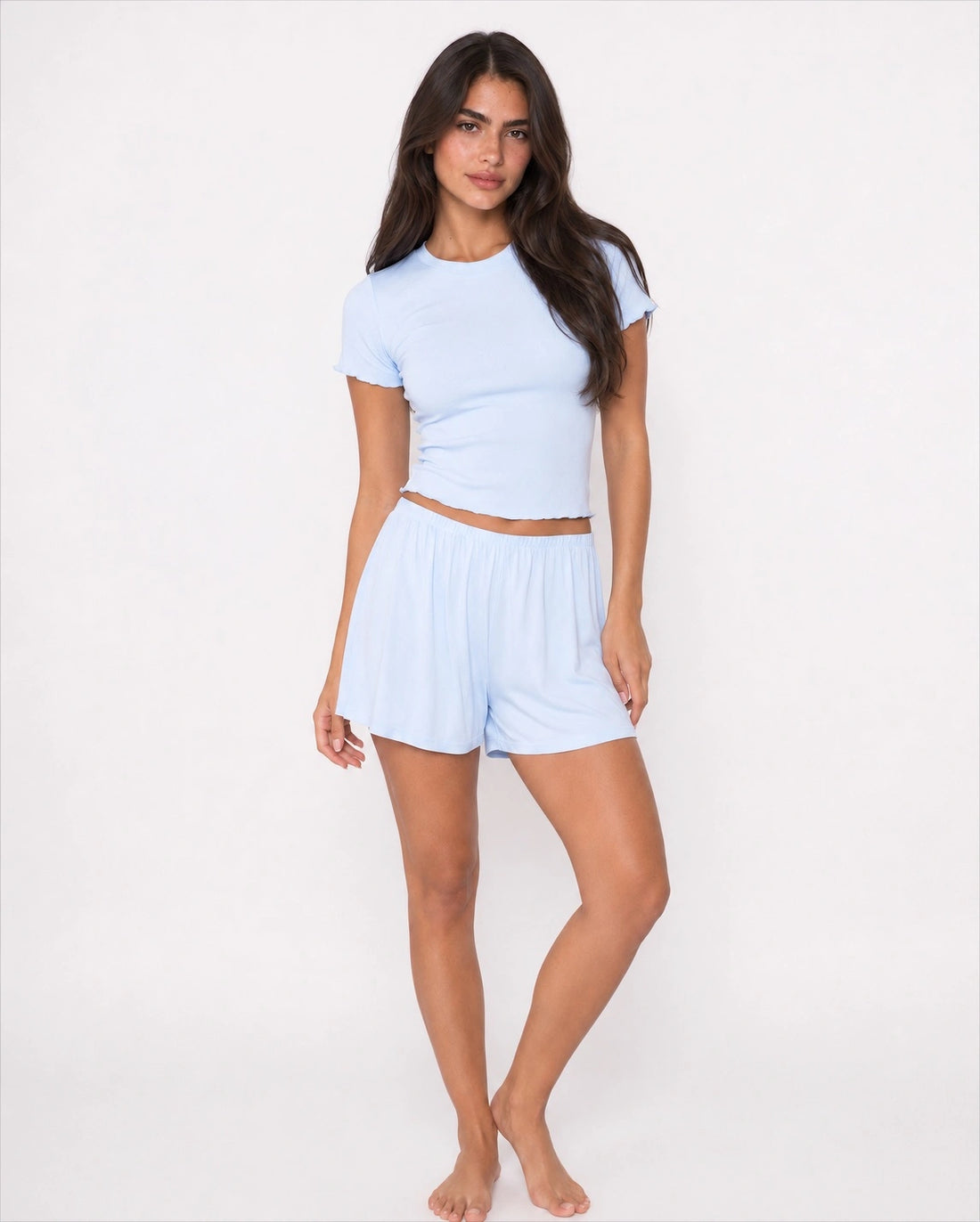 Woman in a light blue lounge set.