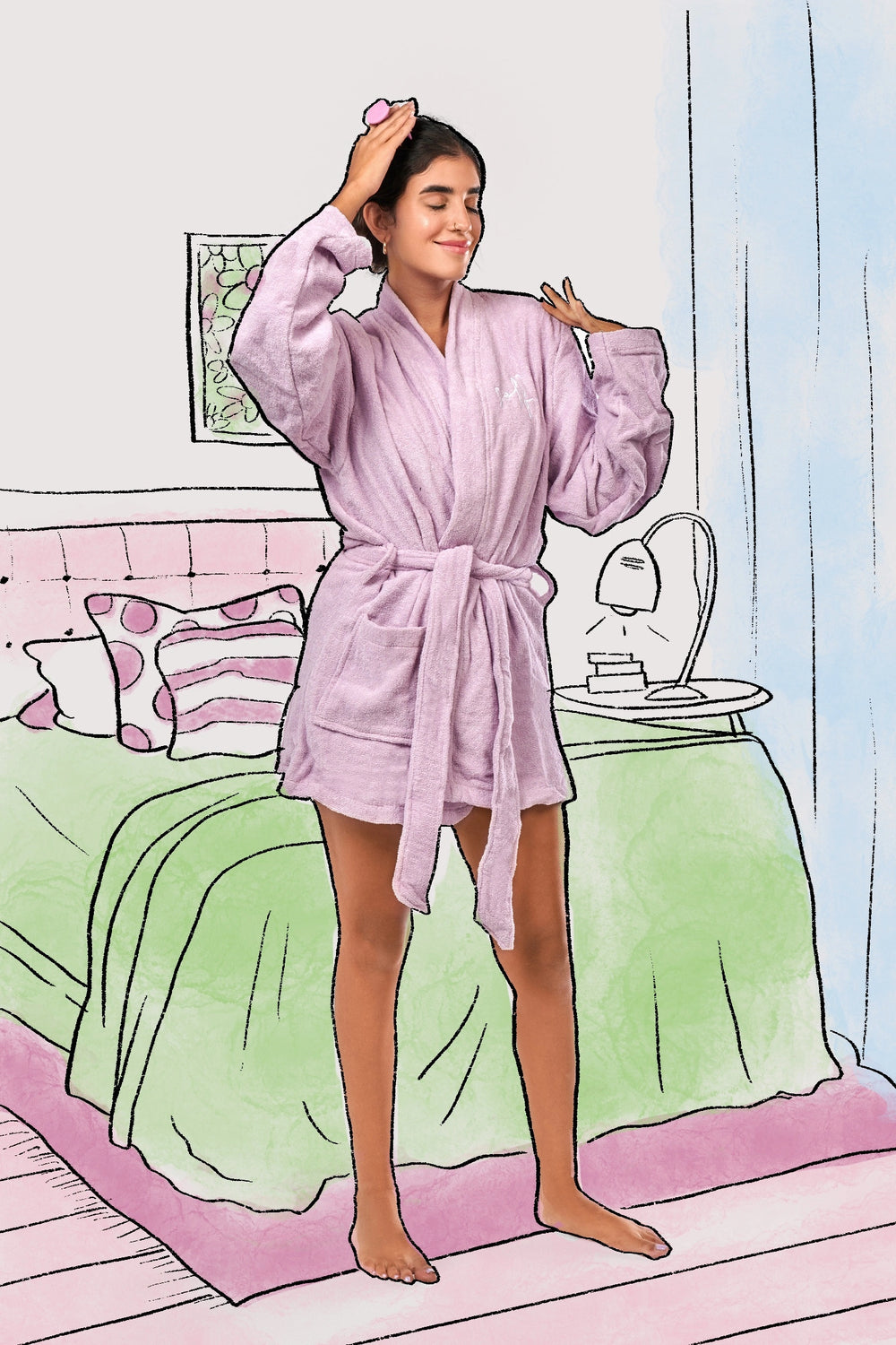 The Mini Bathrobe in lilac, a soft and elegant 100% cotton bathrobe for cozy moments at home.