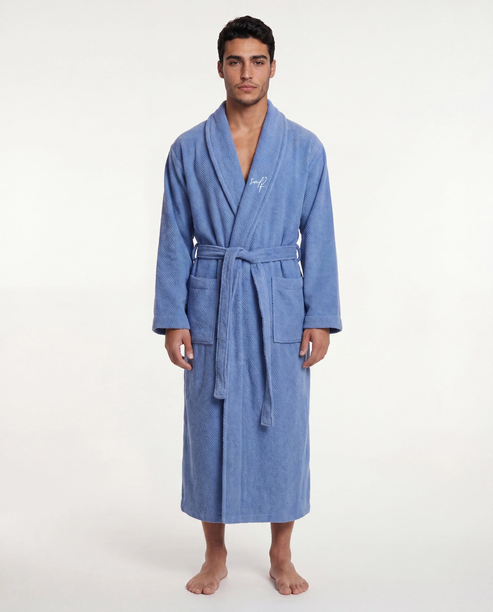 Man wearing a blue robe on a white background