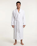 Man wearing a white robe with a logo on a white background