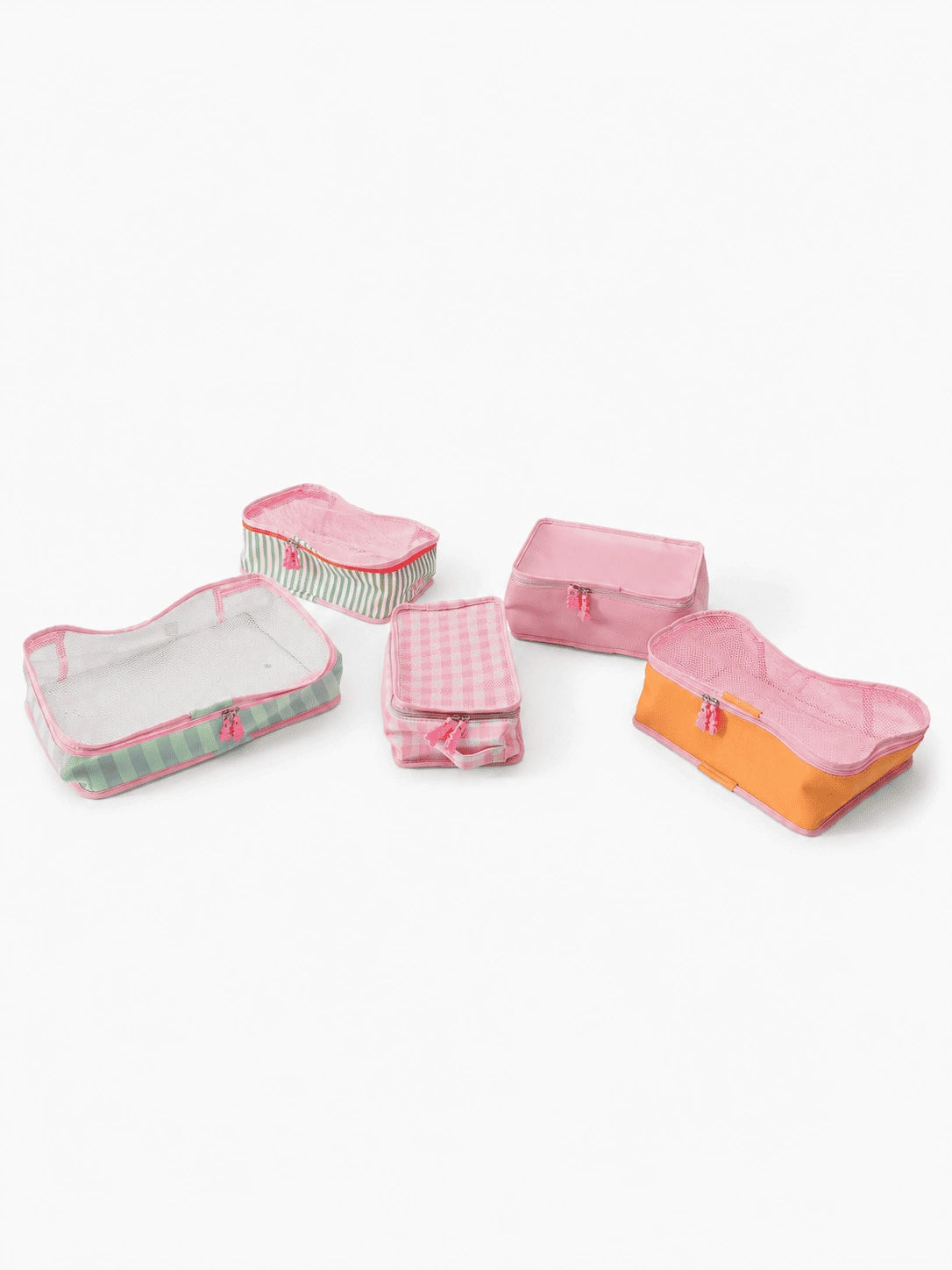 Five pink fabric baby storage pouches and organizers in various sizes and patterns, including stripes, gingham, and solid pink, arranged on a white background.